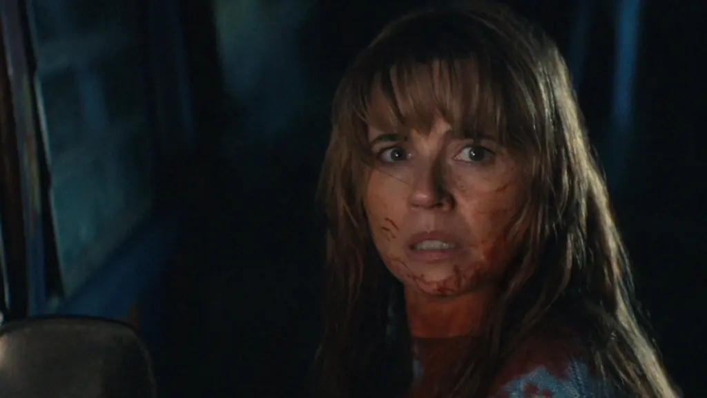 Linda Cardellini stars as Pamela Voorhees in the Friday the 13th prequel series CRYSTAL LAKE streaming only on Peacock.