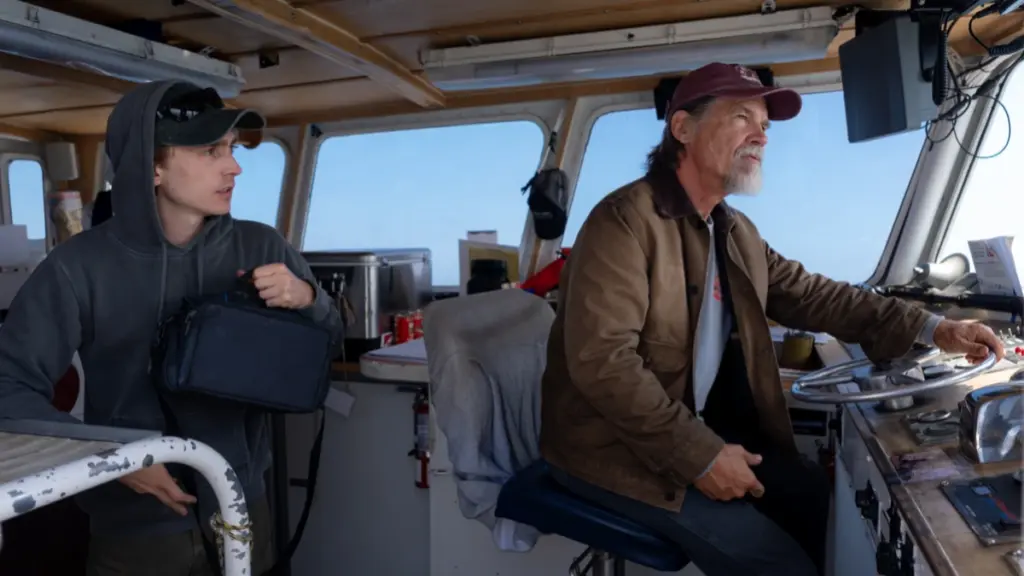 Josh Brolin and Austin Abrams bond together as father and son while driving a boat in WHALEFALL.